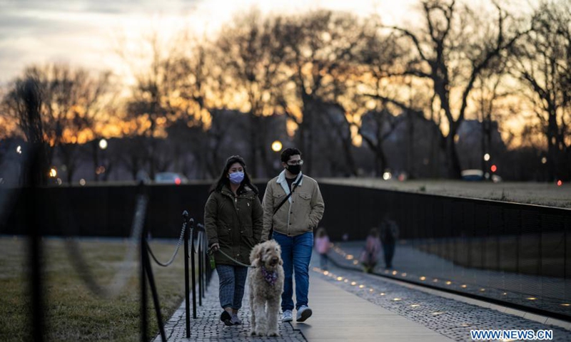 People tour the National Mall in Washington D.C., the United States, Feb. 27, 2021.Photo:Xinhua