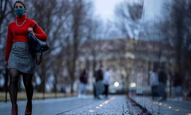 People tour the National Mall in Washington D.C., the United States, Feb. 27, 2021.Photo:Xinhua