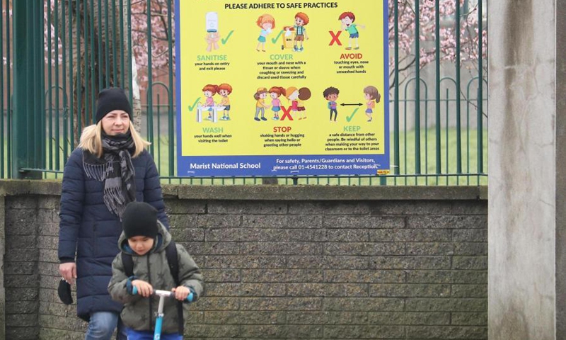 A student heads to a school in Dublin, Ireland, on March 1, 2021. Primary and secondary schools in Ireland on Monday reopened as scheduled under a phased plan previously announced by the government.Photo:Xinhua