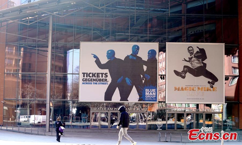 People pass by posters for the 71st Berlin International Film Festival in Berlin, Germany.Photo:China News Service