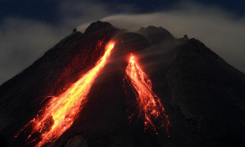 Volcanic materials spew from Mount Merapi in Yogyakarta, Indonesia ...