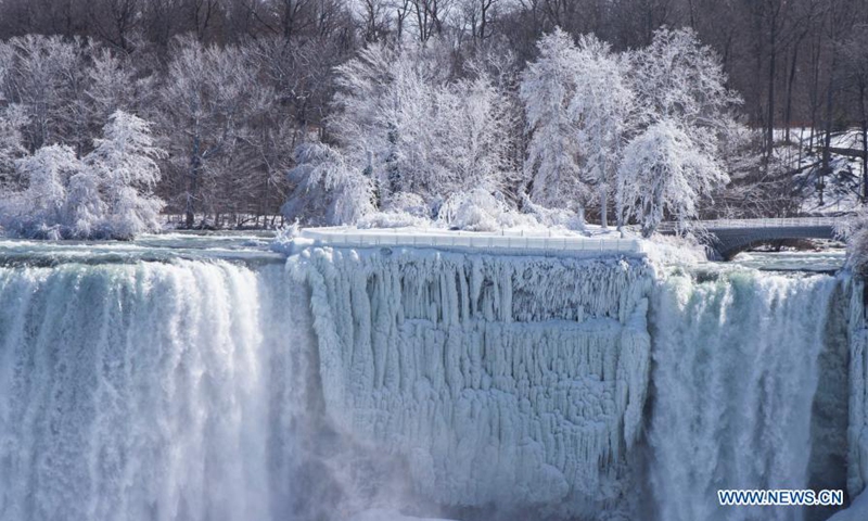 Ice and snow covered Niagara Falls is seen at the base of the Canadian side of Niagara Falls in Ontario, Canada, on March 2, 2021.(Photo: Xinhua)