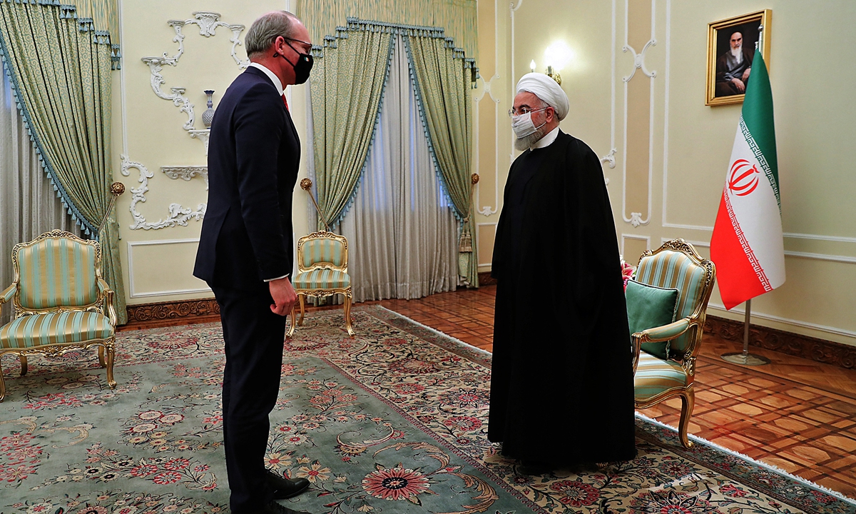 A handout picture provided by the Iranian presidency on Sunday shows Iran's President Hassan Rouhani (right) receiving Irish Minister for Foreign Affairs Simon Coveney in Tehran, Iran. The minister will discuss the Iran nuclear deal as part of Ireland's role on the UN Security Council. Photo: AFP