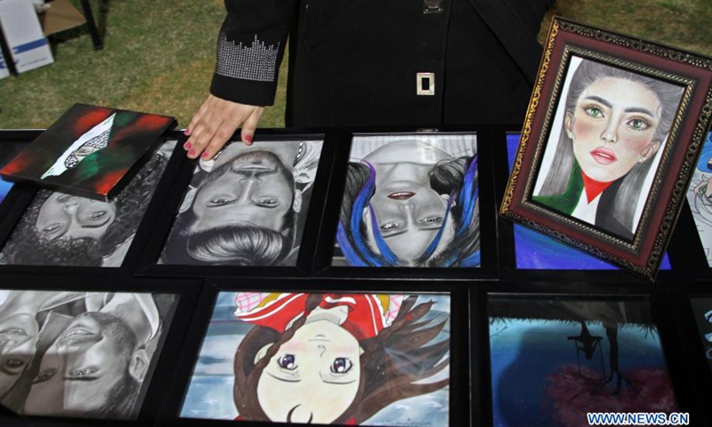 Artworks are displayed at a handicraft exhibition in Gaza City, on March 6, 2021.(Photo: Xinhua)