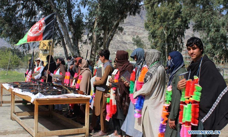 Militants attend a surrender ceremony in Asadabad, capital of Kunar province, Afghanistan, March 10, 2021. Twenty-five militants on Wednesday surrendered to the government authorities in Afghanistan's eastern Kunar province, the province governor said.(Photo: Xinhua)