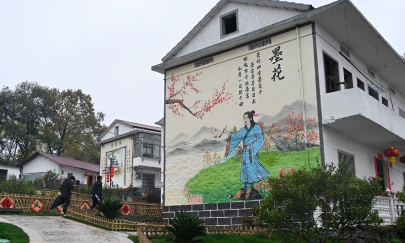 People tour in Moshan Village of Anyi County, east China's Jiangxi Province, March 11, 2021. Anyi County has put efforts into developing tourism industry by integrating natural and cultural resources.Photo:Xinhua