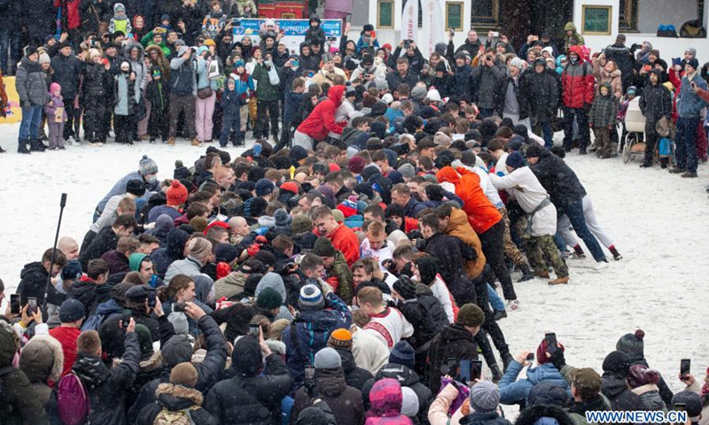 People participate in a mass fight competition during the Maslenitsa celebration in Moscow, Russia, on March 13, 2021. Maslenitsa is a traditional holiday to celebrate the beginning of spring.(Photo: Xinhua)