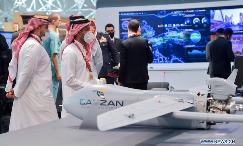 Visitors look at exhibits after the opening ceremony of Milipol Qatar 2021, an international event for homeland security and civil defense, in Doha, Qatar, on March 15, 2021. The exhibition which kicked off on Monday will last until March 17.(Photo: Xinhua)