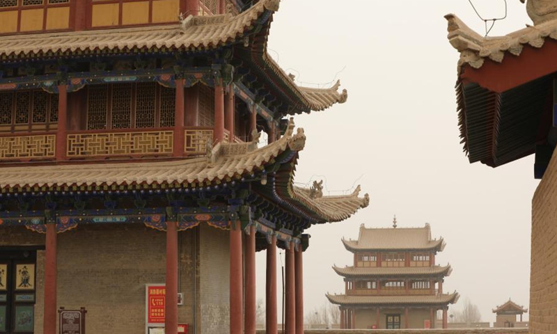 Photo taken on March 17, 2021 shows the Jiayu Pass shrouded in dust in Jiayuguan City, northwest China's Gansu Province. Some areas in Hexi Corridor, part of the ancient Silk Road in China's northwest, were covered by floating sand and dust on Wednesday.(Photo: Xinhua)