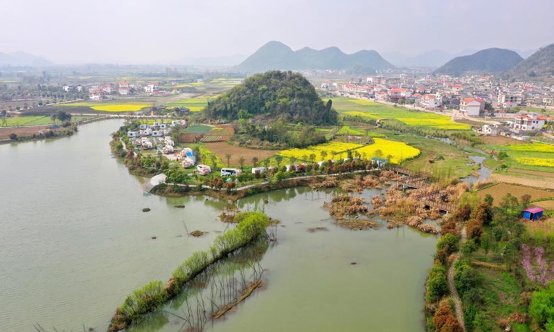 Aerial photo taken on March 17, 2021 shows the spring scenery at the Xiaohewan Village, Anshun City of southwest China's Guizhou Province.Photo:Xinhua