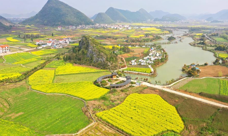 Aerial photo taken on March 17, 2021 shows the spring scenery at the Xiaohewan Village, Anshun City of southwest China's Guizhou Province.Photo:Xinhua