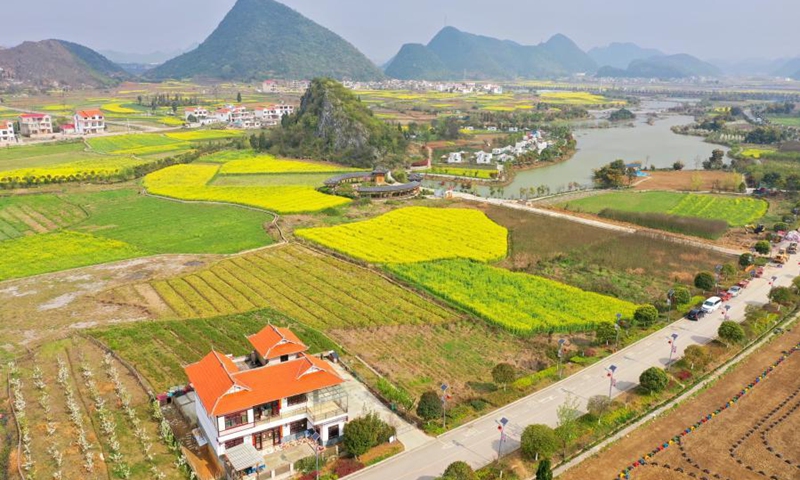 Aerial photo taken on March 17, 2021 shows the spring scenery at the Xiaohewan Village, Anshun City of southwest China's Guizhou Province.Photo:Xinhua