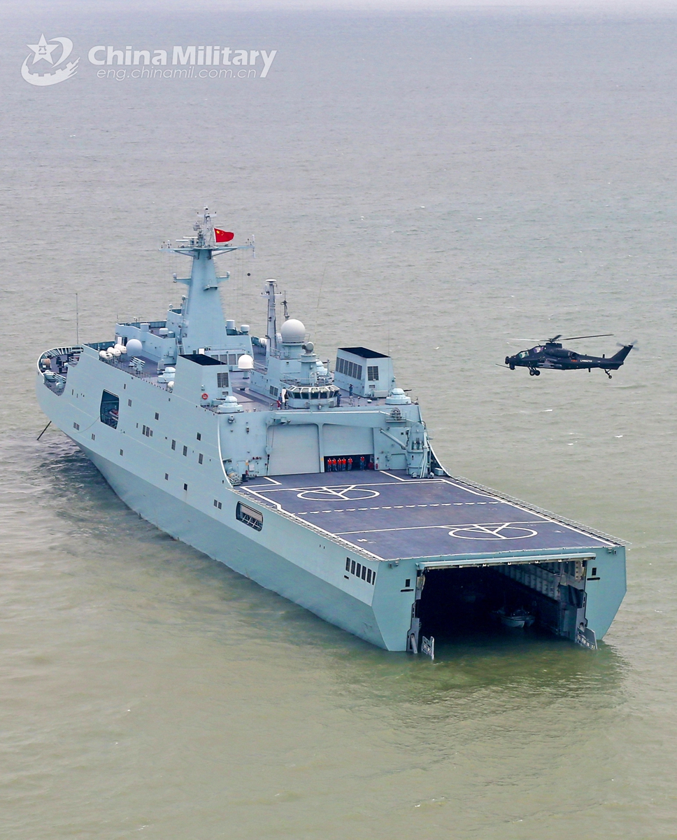 A helicopter attached to an army aviation brigade under the PLA 72th Group Army hovers before deck landing during a joint training exercise with a unit of PLA Navy on February 28, 2021.Photo: China Military Online