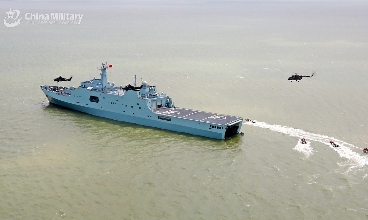 Helicopters attached to an army aviation brigade under the PLA 72th Group Army hover at an extremely-low altitude during a joint training exercise with a unit of PLA Navy on February 28, 2021.Photo: China Military Online