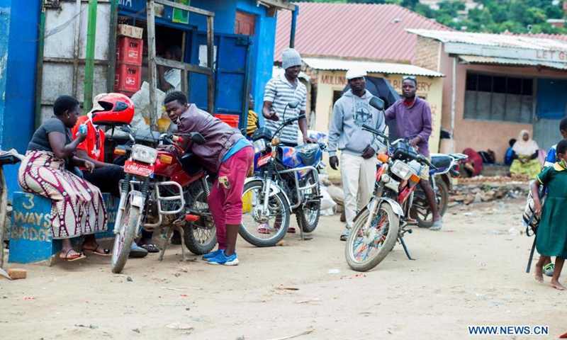 Motorcycle taxi operators wait for passengers in Blantyre, Malawi, on March 17, 2021. Motorcycle taxi is likely to boom in Malawi as the government announced it will remove duty on motorcycles in efforts to promote the motorcycle taxi locally known as Kabaza in Malawi.(Photo: Xinhua)