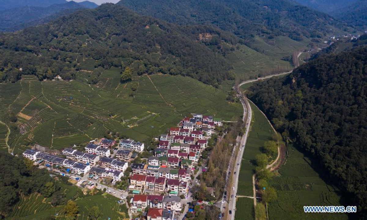 Aerial photo shows tea gardens at Meijiawu Village of Hangzhou City, east China's Zhejiang Province, March 23, 2021. Longjing tea, also known as West Lake Dragon Well tea, is characterized by its green color, delicate aroma, mellow taste and beautiful shape.