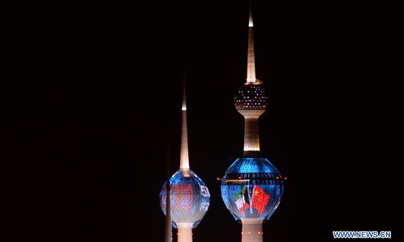 Kuwait Towers are illuminated with Chinese and Kuwaiti flags in Kuwait City, Kuwait, on March 22, 2021. Monday marks the 50th anniversary of the establishment of diplomatic relations between China and Kuwait.(Photo: Xinhua)