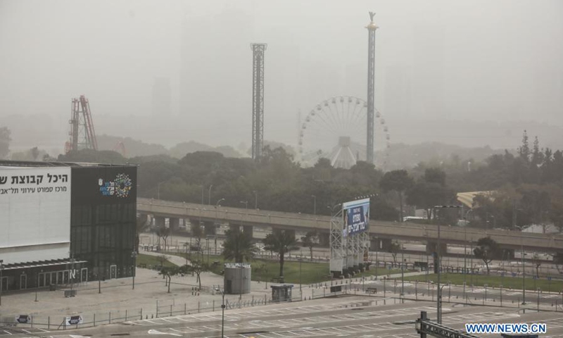 Photo taken on March 24, 2021 shows a view of a dust storm hitting Tel Aviv, Israel.(Photo: Xinhua)