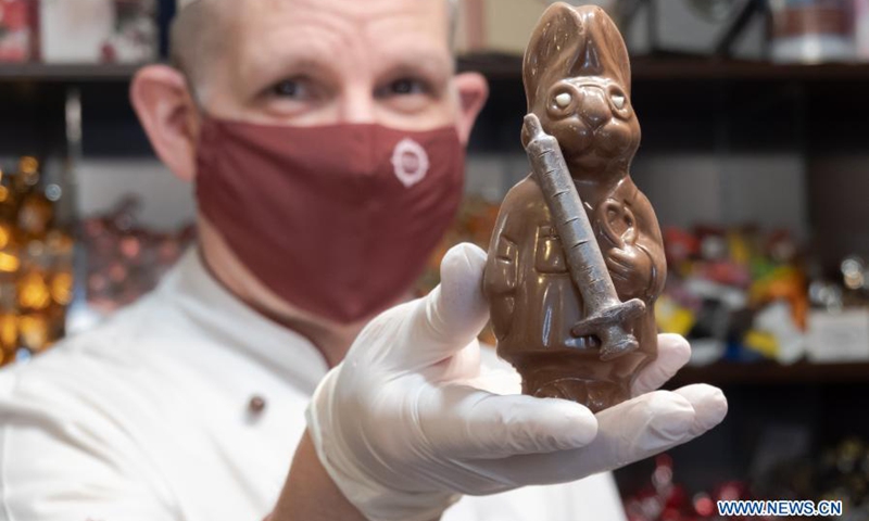 Hungarian confectioner inspires hope with syringe-holding Easter ...