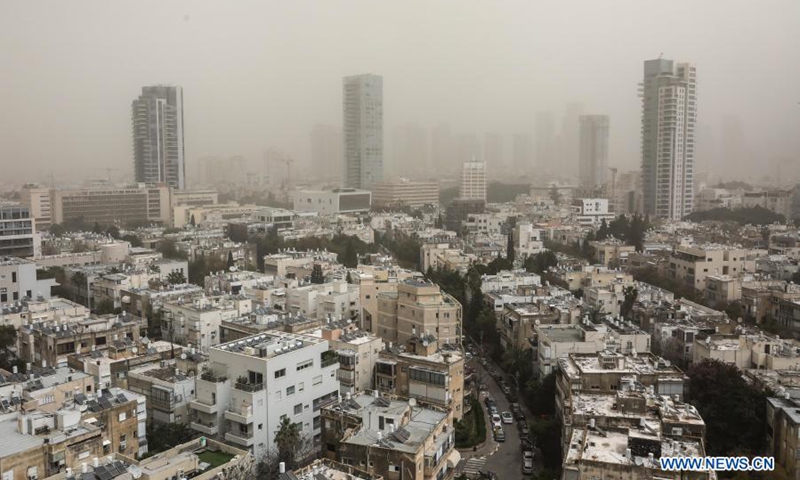 Photo taken on March 24, 2021 shows a view of a dust storm hitting Tel Aviv, Israel.(Photo: Xinhua)