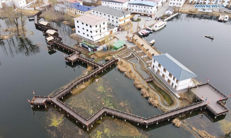 Aerial photo taken on March 16, 2021 shows a village at Baiyangdian Lake of Xiongan New Area, north China's Hebei Province. The Xiongan new area has begun its large-scale development and construction, with more than 100,000 constructors working on over 120 major projects in the area. The city of the future is greeting a brand new look day by day.  Photo: Xinhua