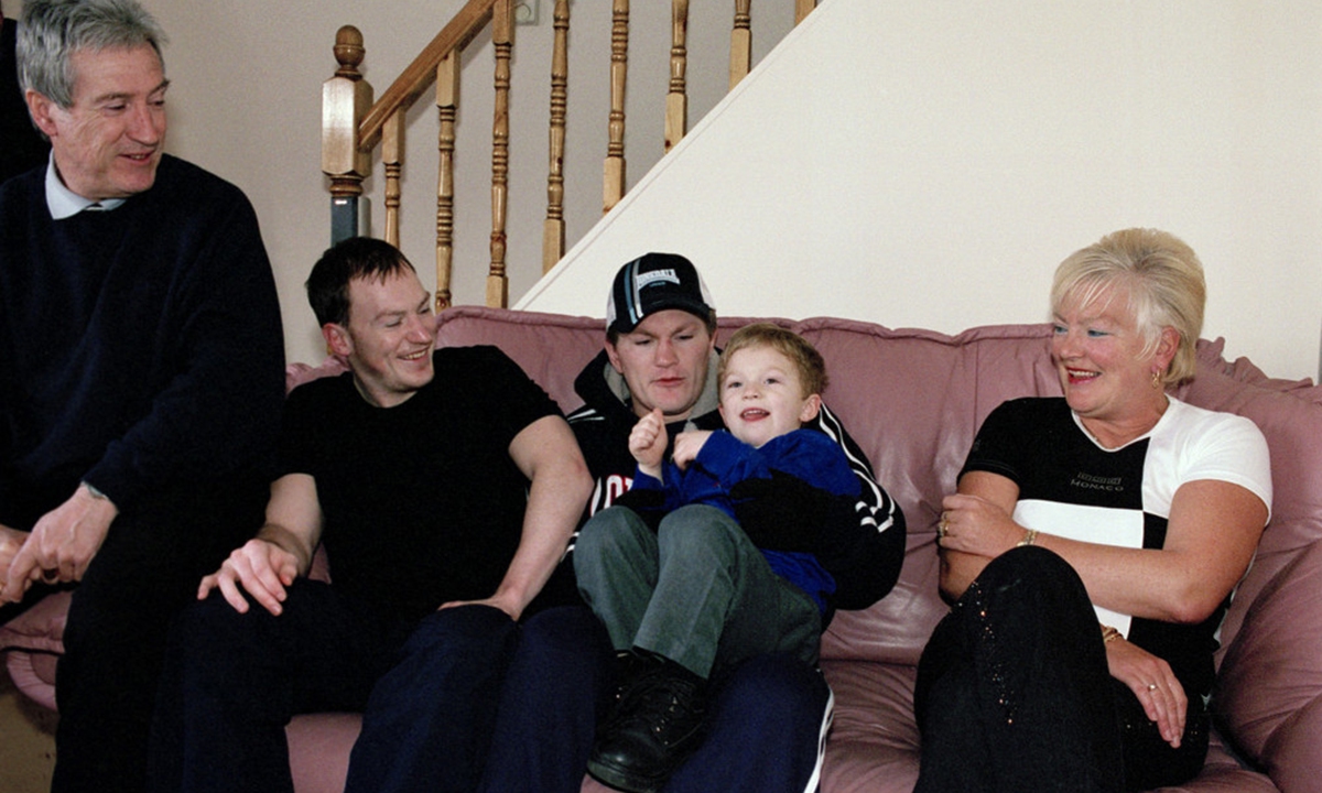 British welterweight boxer Ricky Hatton is pictured at home with (from left) his father Ray, his brother Matthew, his son Campbell and his mother Carol in 2007. Photo: IC