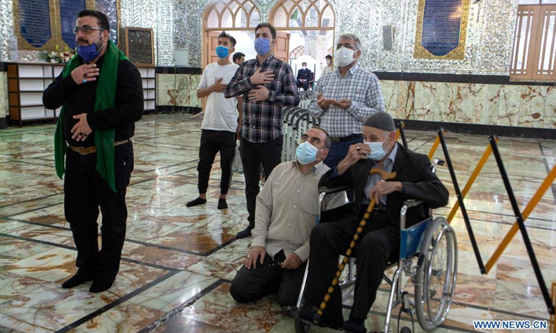 People pray at the shrine of Shah Abdulazim during the holy month of Ramadan in Shahr-e Rey, south of Tehran, Iran, April 19, 2021. Photo: Xinhua