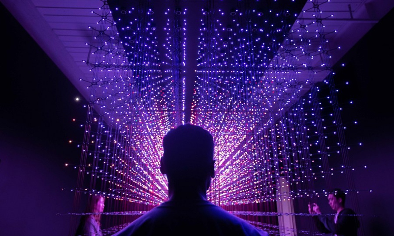 People visit the Lumen exhibition at a gallery in Chippendale, New South Wales, Australia, on April 18, 2021.(Photo: Xinhua)