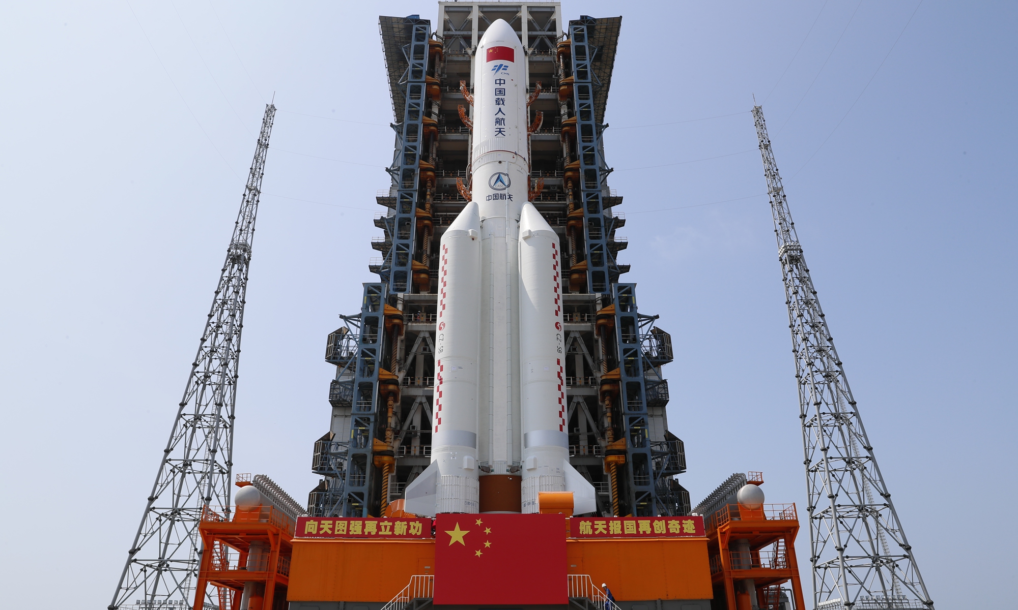 China's space station core cabinet-rocket combination rolls out to the ...