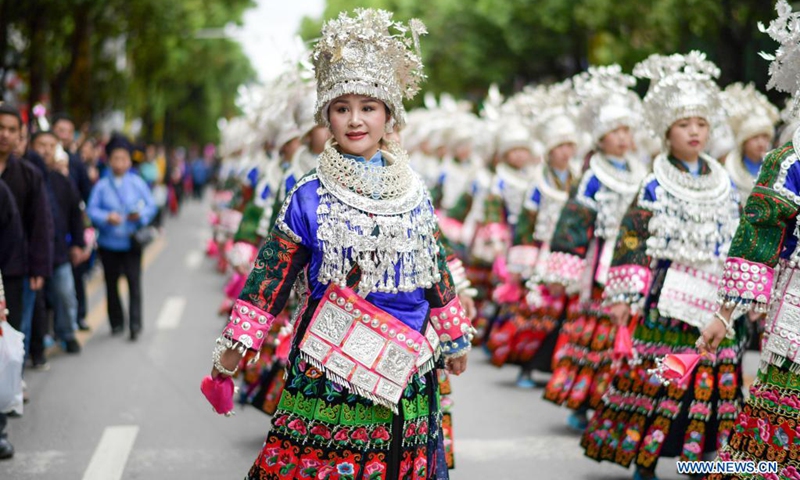 People of Miao ethnic group attend a parade to celebrate the Miao Sisters Festival in Taijiang County, Qiandongnan Miao and Dong Autonomous Prefecture, southwest China's Guizhou Province, April 25, 2021. Recognized as a national intangible cultural heritage, the Miao Sisters Festival is celebrated annually around the 15th day of the third lunar month according to the lunar calendar in China.(Photo: Xinhua)