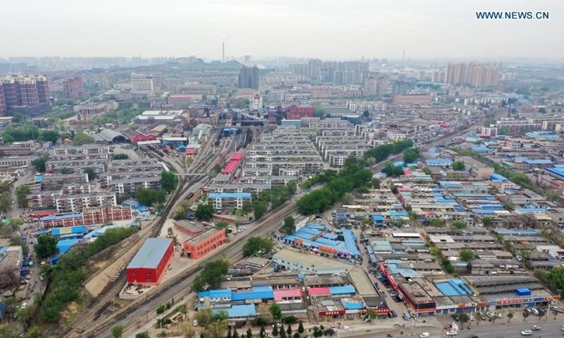 Aerial photo taken on April 26, 2021 shows the Kailuan coal mine in Tangshan City, north China's Hebei Province. Tangshan City in north China's Hebei Province, leaning against the Yanshan Mountains, facing the Bohai Sea, and abutting Beijing and Tianjin, is the cradle of China's modern industry, a recovery miracle after the horrific earthquake in 1976 and also the hometown of Li Dazhao, a co-founder of the Communist Party of China (CPC).Photo: Xinhua