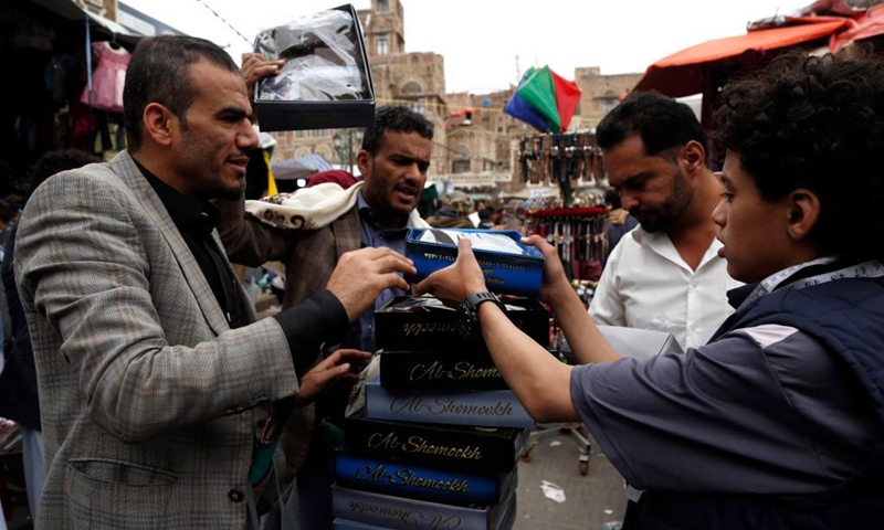 Yemenis shop ahead of Eid al-Fitr at a market in Sanaa, Yemen, on May 5, 2021. Eid al-Fitr marks the end of the fasting month of Ramadan.(Photo: Xinhua)