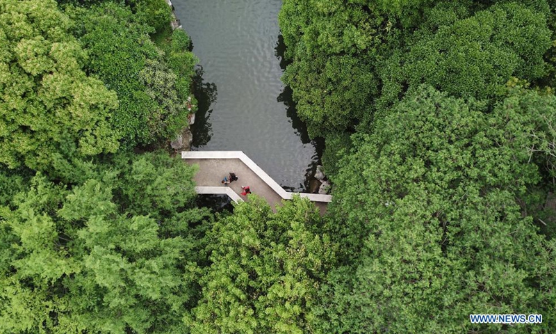 In this aerial photo, people stroll in Huancheng Park in Hefei, capital of east China's Anhui Province, May 5, 2021.(Photo: Xinhua)