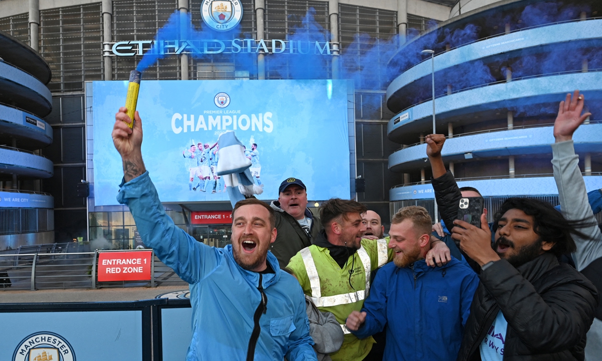 Guardiola hails Man City 'legends' after title defence