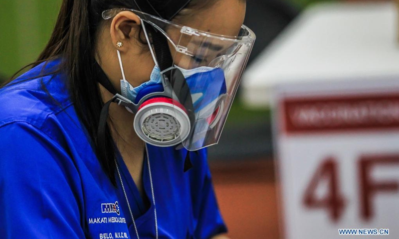 A nurse wearing a protective mask is seen on duty inside a hospital in Manila, the Philippines on May 12, 2021, the International Nurses Day.(Photo: Xinhua)