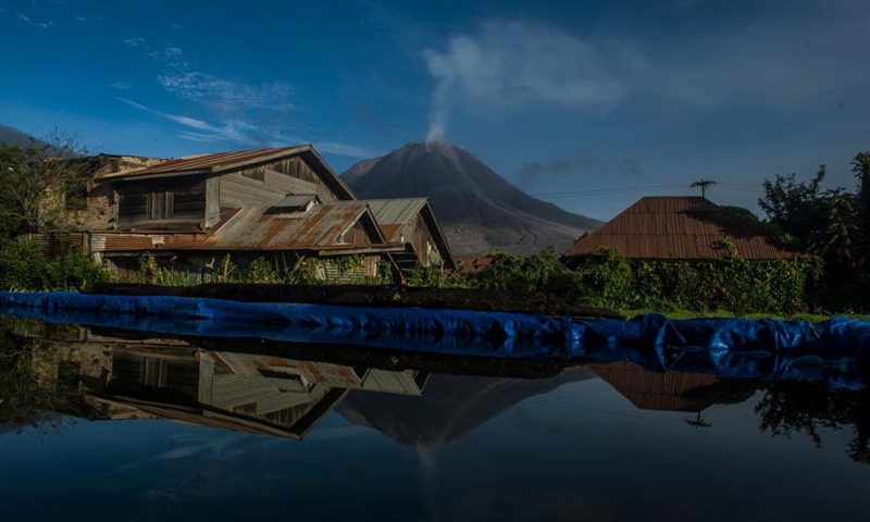 White smoke spews from Mount Sinabung as seen from Karo district, North Sumatra, Indonesia, May 13, 2021. (Photo:Xinhua)