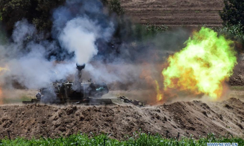 Israeli army artillery corps fire towards Gaza near the Israel-Gaza border near southern Israeli city of Sderot on May 16, 2021.(Photo: Xinhua)