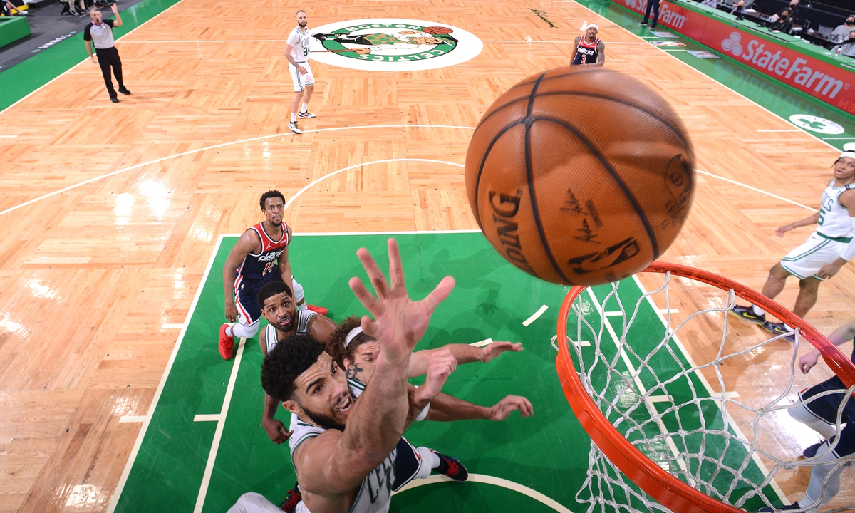 Jayson Tatum of the Boston Celtics shoots the ball against the Washington Wizards on Tuesday in Boston. Photo: VCG
