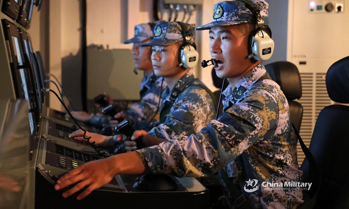 Soldiers assigned to a naval landing ship flotilla under the PLA Southern Theater Commandoperate the equipment during a combat training exercise in late April, 2021. (eng.chinamil.com.cn/Photo by Liu Jinyu) 