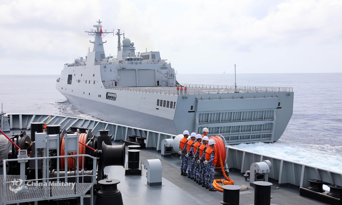 Vessels attached to a naval landing ship flotilla under the PLA Southern Theater Commandperform simulated underway astern replenishment during a combat training exercise in late April, 2021. (eng.chinamil.com.cn/Photo by Liu Jinyu)