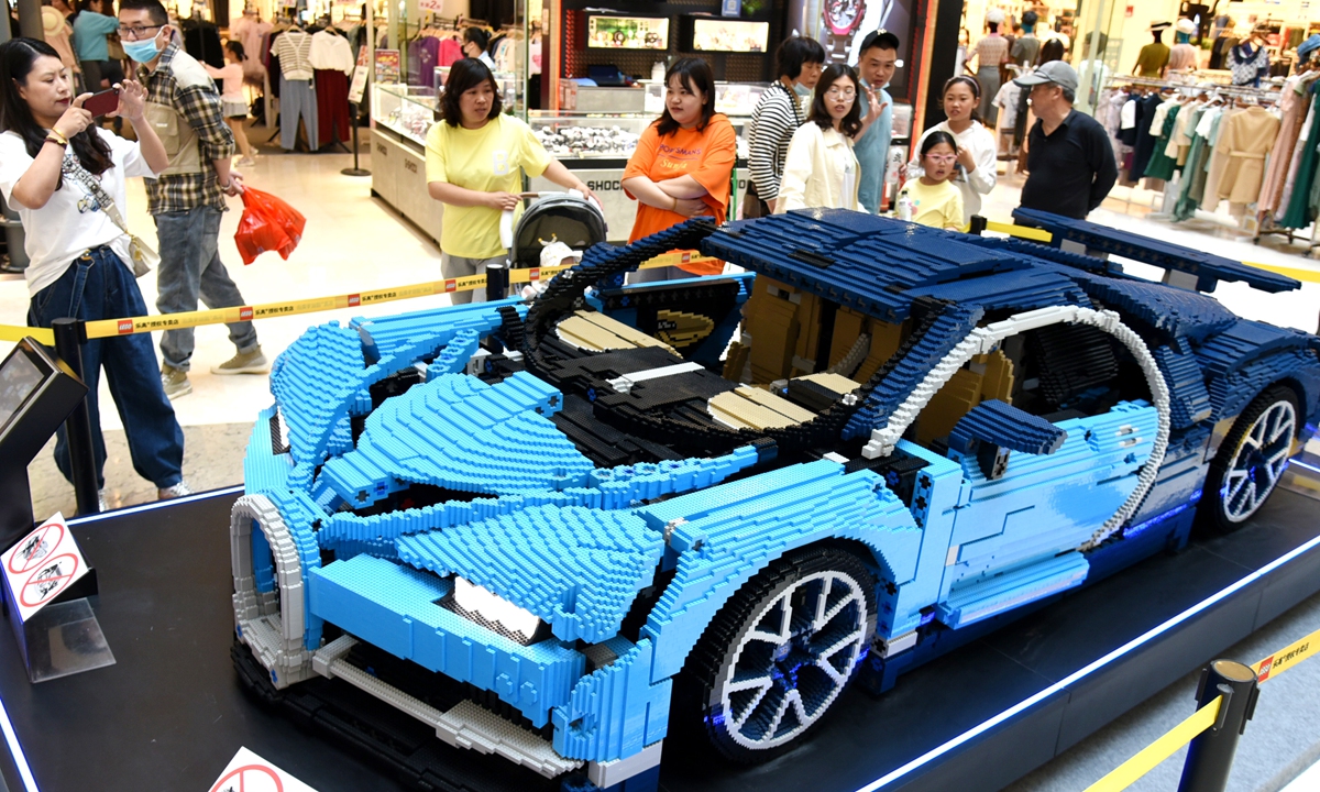 A Bugatti car built with more than 200,000 building blocks is displayed at a square in Lianyungang, East China's Jiangsu Province. Photo: IC