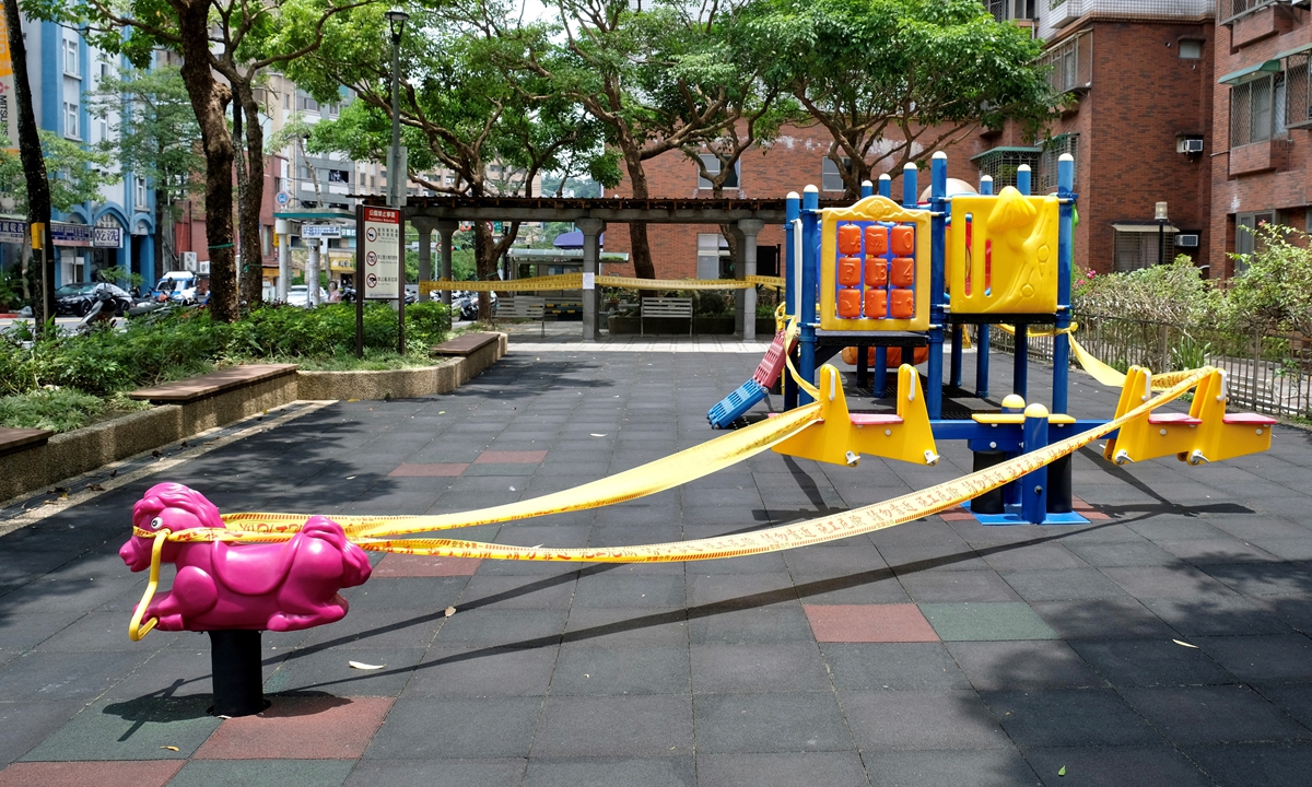 A community park, closed due to social distancing measures following a spike in COVID-19 cases, is seen in Taipei on May 22. Photo: AFP
