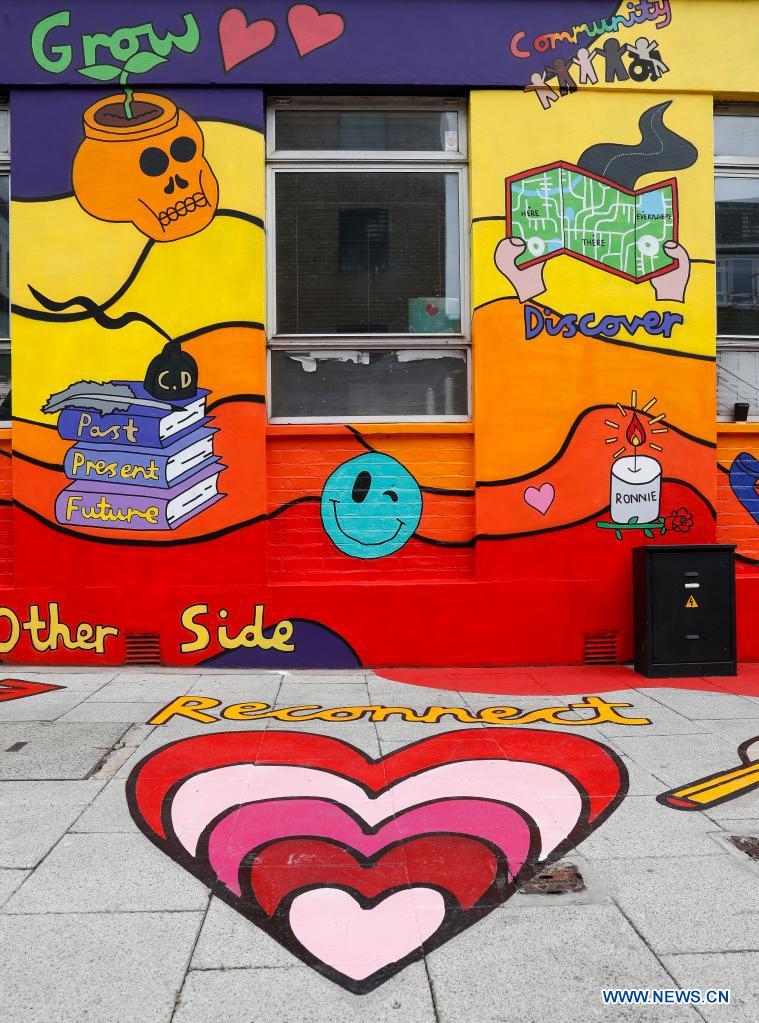 Photo taken on May 26, 2021 shows the artwork He(art) is Everywhere near Tate Modern in London, Britain. New artworks of the project Beyond Boundaries unveiled near Tate Modern. The artworks are aimed at reconnecting people with each other. (Xinhua/Han Yan)