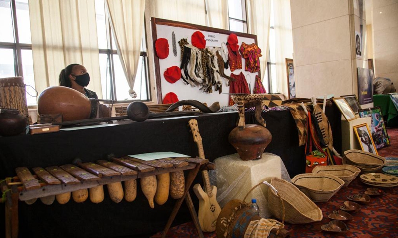 Traditional musical instruments and artworks are displayed at an exhibition during the launch of the Africa Day theme rollout in Lusaka, Zambia, May 26, 2021. Zambia on Wednesday launched the rollout exercise of promoting the 2021 Africa Day commemoration. The theme for this year's commemoration is Arts, Culture and Heritage: Levers for Building the Africa We Want. (Photo by Martin Mbangweta/Xinhua)
