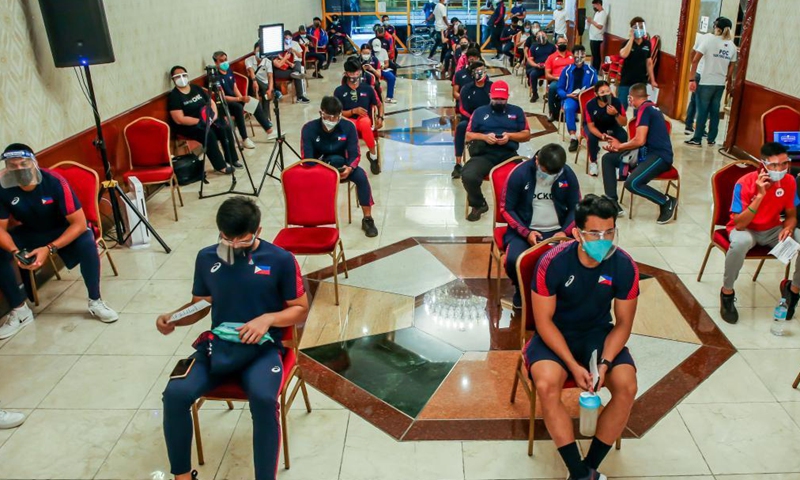 Athletes wait to receive COVID-19 vaccines in Manila, the Philippines on May 28, 2021. Around 700 athletes including dozens of athletes who are qualified for the Tokyo Olympics and are about to participate in the Olympic trials, as well as those who will participate in this year's Southeast Asian Games were vaccinated.Photo:Xinhua