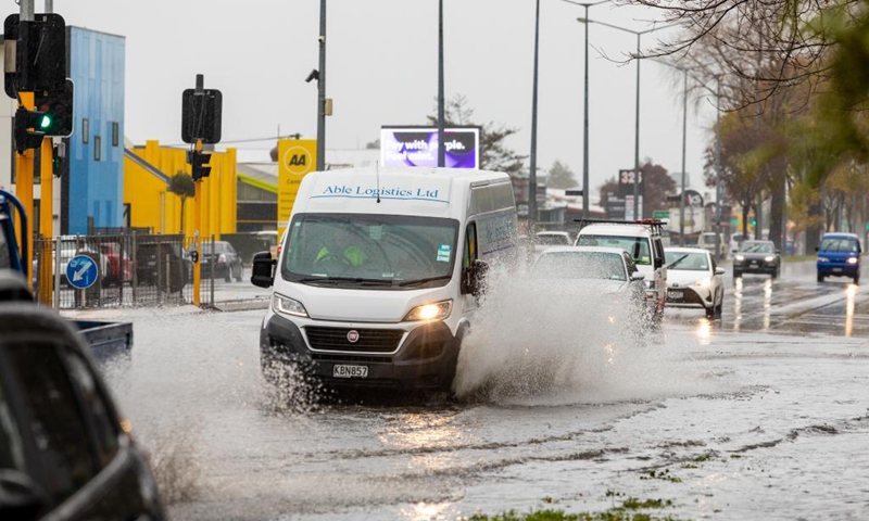 Vehicles run on a flooded road in Christchurch, New Zealand, May 31, 2021.Photo: Xinhua