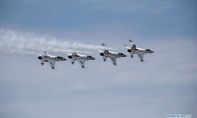 Jets of the United States Air Force Thunderbirds perform during the Bethpage Air Show at Jones Beach on Long Island of New York, the United States, May 31, 2021. Postponed over the weekend due to bad weather, Bethpage Air Show was staged Monday at Jones Beach on Long Island featuring military planes flying in formations and parachuting along with colorful smokes.Photo:Xinhua 