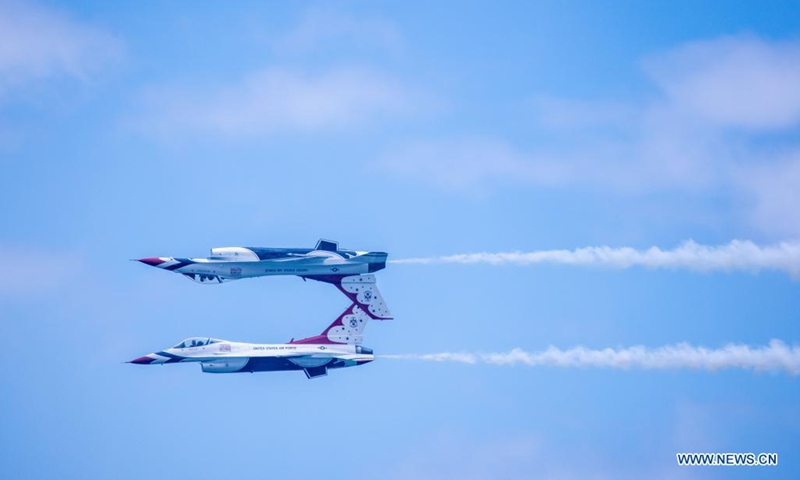 Jets of the United States Air Force Thunderbirds perform during the Bethpage Air Show at Jones Beach on Long Island of New York, the United States, May 31, 2021. Postponed over the weekend due to bad weather, Bethpage Air Show was staged Monday at Jones Beach on Long Island featuring military planes flying in formations and parachuting along with colorful smokes.Photo:Xinhua 