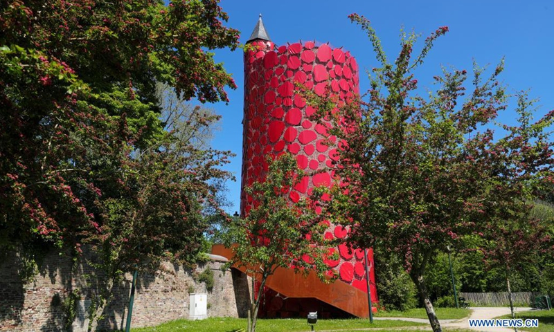 The art installation And the World Keeps Turning by Nnenna Okore is seen in Bruges, Belgium, June 1, 2021. From May 8 to Oct. 24, the third Triennial Bruges brings contemporary art and architecture to the city with rich history. With the theme TraumA, art pieces created by thirteen artists and architects were shown in different places in the city.(Photo: Xinhua)