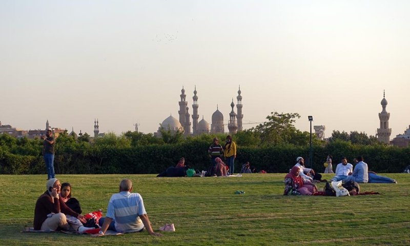 People spend time at Al-Azhar Park in Cairo, Egypt, on June 5, 2021. Parks in Cairo, which were reopened since mid-May to the public with anti-COVID-19 measures strictly implemented, attract more and more people as the country's coronavirus pandemic recedes with per-day cases dropping to less than 1,000 for consecutive days.(Photo: Xinhua)